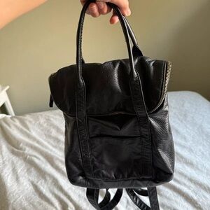 Uniqlo Black Backpack with Gold Accents